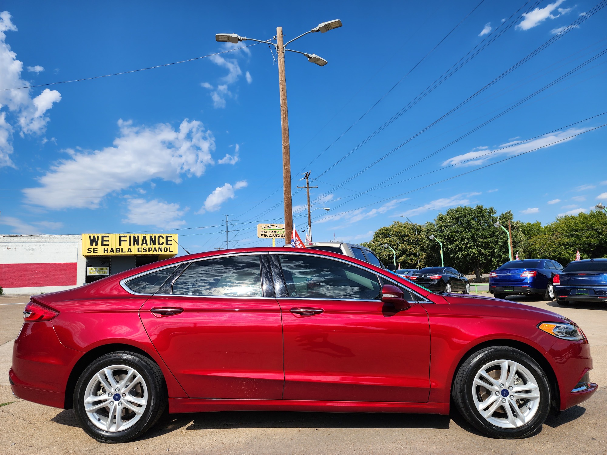 2018 RED Ford Fusion SE (3FA6P0HD2JR) with an 1.5L L4 DOHC 16V engine, 6A transmission, located at 2660 S.Garland Avenue, Garland, TX, 75041, (469) 298-3118, 32.885551, -96.655602 - Welcome to DallasAutos4Less, one of the Premier BUY HERE PAY HERE Dealers in the North Dallas Area. We specialize in financing to people with NO CREDIT or BAD CREDIT. We need proof of income, proof of residence, and a ID. Come buy your new car from us today!! This is a 2019 FORD FUSION SE SEDAN! - Photo #2